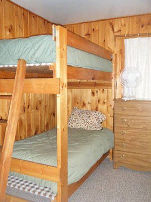 Cabin #14's 4th Bedroom has 2 sets of twin size bunk beds.  (2 top bunks, 2 bottom bunks)