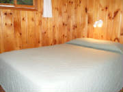 Cabin #14 offers 2 queen bedrooms, 1 king bedroom, and 1 bedroom with 2 sets of bunk beds.  Linens and blankets provided.