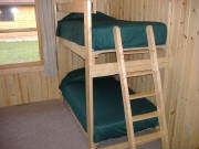 Bunk Bedroom with Dresser and Closet