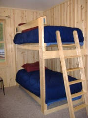 Bunk Bedroom with dresser & closet