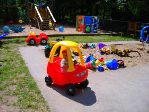 Little Tykes Large Playground.  Riding Toys for pre-school age kids.  Sand toys, slides, and swings for all ages.  Glider & lawn chairs for adult relaxation!