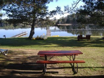 Cabin #3's view of the lake from the dining table.  This cabin sits approximately 25 feet from the water's edge.  Great Location!  Great view!