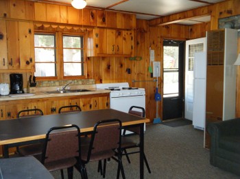 Cabin 3 kitchen is full stocked with pans/dishes/silverware and full size appliances.  Microwave & automatic coffee pot.  