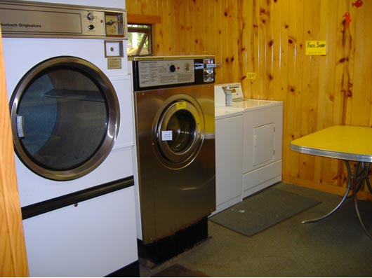 Coin Operated Laundry facility,  Triple Loader Washing Machine & Dryer,  Plus Regular Household size Washer & Dryer.  Non-phosphorus (environmentally friendly) Laundry Soap Available for our guests staying at Towering Pines Resort.